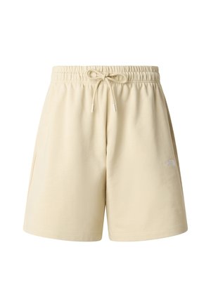 Light beige cotton shorts with an elastic waistband and adjustable drawstring. Features pockets and a small white logo on the side.