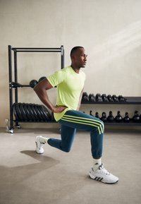 adidas Sportswear FUTURE ICONS 3-STRIPES - Pantalones deportivos - arctic night