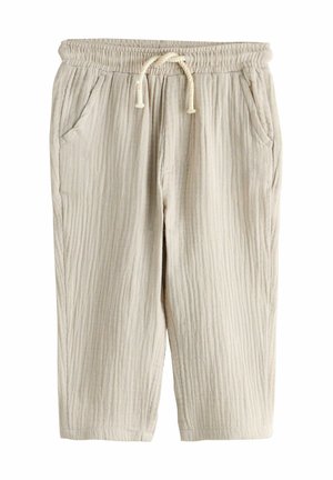 Bēšas kokvilnas maisījuma īsie bikses ar elastīgu jostu, auklu un divām sānu kabatām. Tekstūra ar vertikālām svītrām.