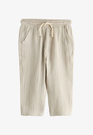 Pantaloni corti beige in misto cotone con vita elasticizzata, coulisse e due tasche laterali. Texture a righe verticali.