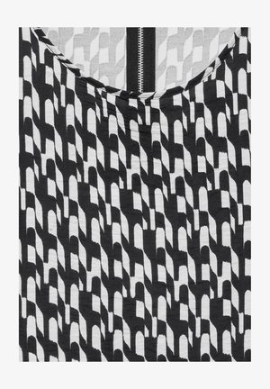 Zwart-witte stof met een geometrisch patroon van in elkaar geweven vormen. Gladde textuur met een zichtbare ritsdetalle aan de bovenkant.