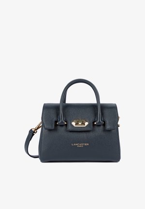 Navy blue textured leather handbag with top handles, gold turn-lock clasp, detachable shoulder strap, and "Lancaster Paris" logo in gold letters.