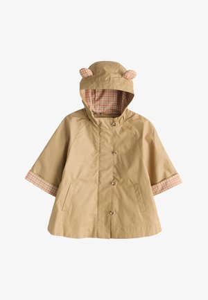 Beige børne-regnjakke med hætte, der har små stofører og ternet pink-beige foer på hætte og ærmekanter.