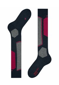 Socken aus dunkelblauem Stoff mit hexagonalen, hellgrauen und pinken Mustern. Die Größen sind auf den Sohlen angegeben; der linke Socken ist mit "R" markiert und der rechte mit "F."