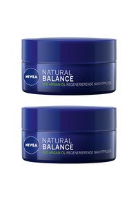 Two round, dark blue cream jars labeled "NIVEA Natural Balance Bio Argan Oil" in white and green text, with smooth, glossy surfaces.