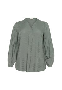 Green, long-sleeve blouse with a V-neck and textured dot pattern. Features gathered cuffs and a flowy silhouette. Lightweight fabric.