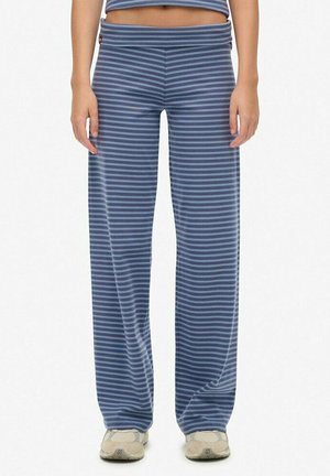 Pantalons ample à rayures verticales bleues et grises avec une texture douce, une taille élastique et un logo de marque subtil au niveau de la hanche.