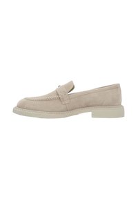 Beige suede loafers with a smooth finish, stitched detailing, and a rubber sole. Features a raised tongue and minimalistic design elements.