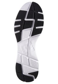 Semelle de basket noir et blanc avec un motif texturé, comportant des rainures pour l'adhérence et un logo en relief sur la section blanche.