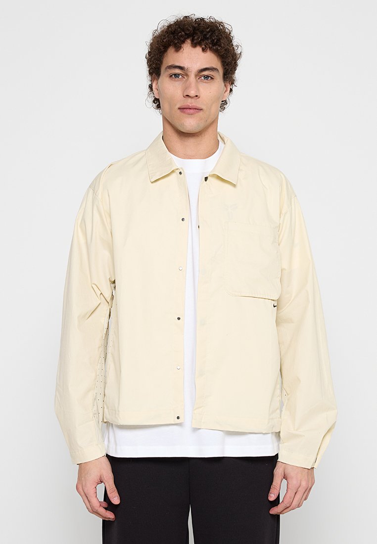 Nike Sportswear Lichte jas beige