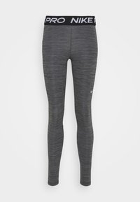 Grå sporttights i texturerat material. Har en svart midja med "NIKE PRO" i vitt. Slim-fit-design med en lätt glans.