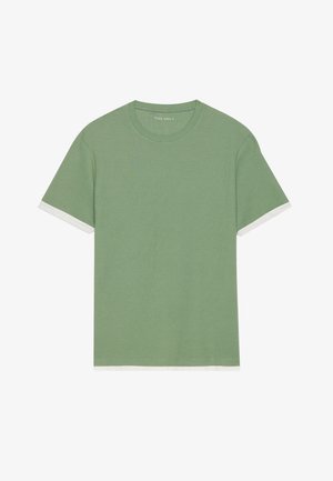 Green short-sleeve T-shirt with a textured knit design. White accents at the cuffs and neckline. Round collar, relaxed fit.