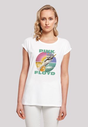 White cotton t-shirt featuring a colorful graphic design with the words "PINK FLOYD" and an illustration of a gun and ocean scene.