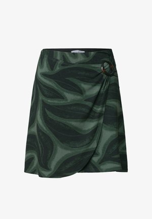 Dark green wrap skirt with large leaf pattern and a black circular buckle on the right side at the waist.