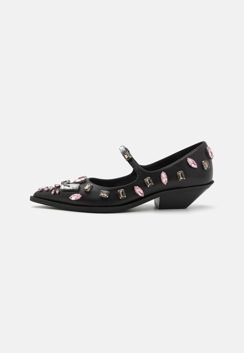 Black leather Mary Jane-style shoe with a pointed toe, embellished with various-shaped stones in pink and clear, featuring a low wedge heel.