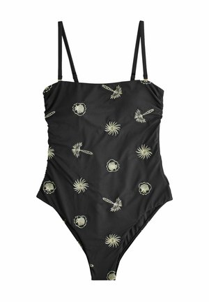 Costum de baie întreg negru cu bretele subțiri, decorat cu modele mici de soare și scoici de culoare crem, răspândite pe material.
