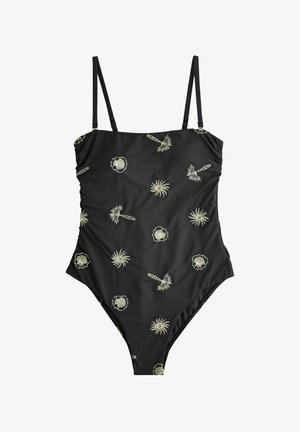 Costum de baie întreg negru cu bretele subțiri, decorat cu modele mici de soare și scoici de culoare crem, răspândite pe material.