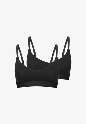 Zwei schwarze, kabellose BHs mit verstellbaren dünnen Schulterträgern und elastischen Unterbändern vor weißem Hintergrund.