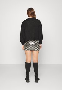Noisy May Petite NMMINDY SEQUIN MINI SKIRT - Minissaia - black/white