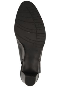 Semelle de chaussure en cuir noir avec un design texturé comportant des rainures ondulées, taille 37 indiquée, et un léger talon pour le soutien.