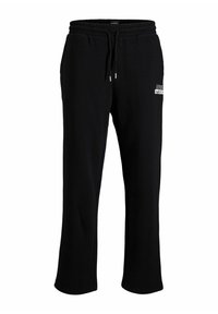 Sorte sweats med elastisk talje og snørebånd, med et hvidt logo på venstre hofte. Lavet af et blødt, tekstureret stof.