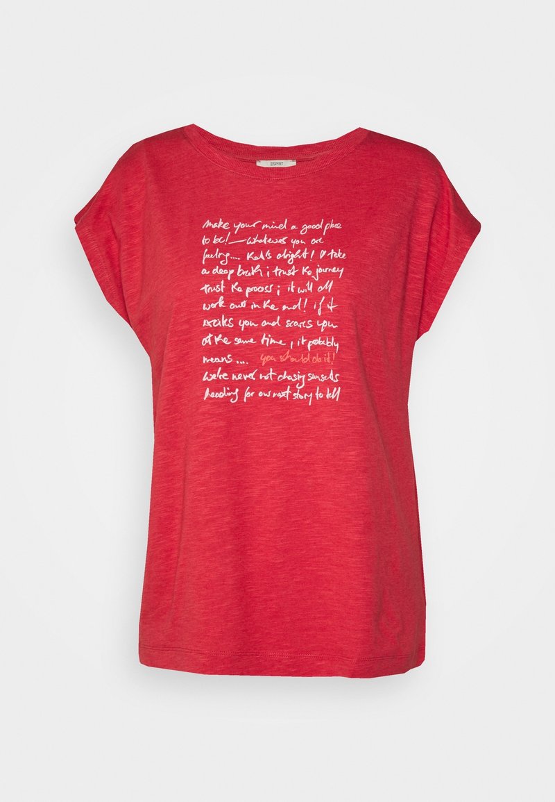 Camiseta de manga corta roja con un ajuste relajado y un cuello redondo. Impresión de texto blanco en la parte delantera con frases motivacionales.
