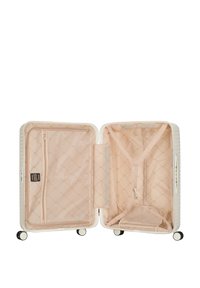White hard-shell suitcase with an opened interior featuring a light beige lining, mesh pocket, cross straps, and four wheels for mobility.