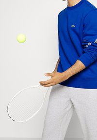 Lacoste Mikina - blue
