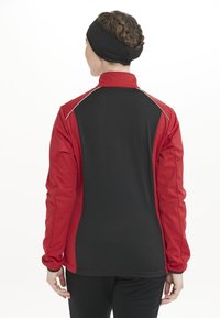 Endurance ZORA - Soft shell jacket - chinese red