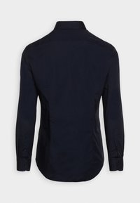Navyblaue Herren Langarm-Hemd, von hinten gezeigt, mit klassischem Kragen und geknöpften Manschetten.