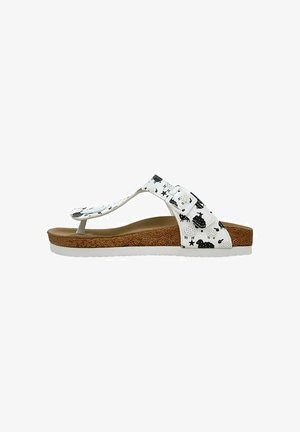Flip-flop sandal with a white patterned strap featuring black designs, a cork footbed, and a white rubber outsole.