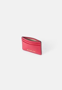 Red leather wallet with a textured finish, featuring multiple card slots and a gold embossed logo on the front.