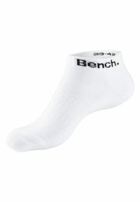 Calzini bianchi alla caviglia realizzati in tessuto misto cotone, con una superficie testurizzata e il logo nero "Bench." stampato sul polsino.