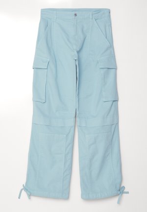 Light blue cargo pants with a relaxed fit. Features oversized side pockets, adjustable cuffs, and a button closure at the waist.