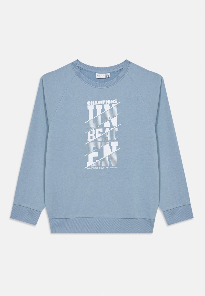 Sweatshirt bleu clair en tissu doux, avec un design graphique en texte blanc comportant "CHAMPIONS" et "UNBEATEN" en police grasse.