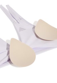 Bas de bikini violet clair avec inserts rembourrés beiges amovibles présenté sur fond blanc.