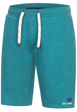 Pantaloni scurți din bumbac de culoare turcoaz, cu un osl pentru talie. Prezintă sfori albe cu accente roșii și broderie logo pe tivul inferior.