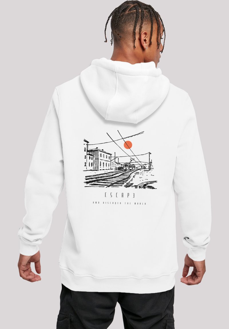 White hoodie featuring a graphic of a train track scene with a red sun, and text reading "ESCAPE AND DISCOVER THE WORLD."