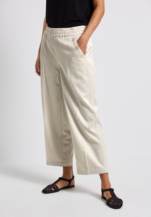 SCHIMMERNDE  - Stoffhose - beige