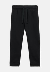 Zwarte slim-fit sweatpants met elastische tailleband en trekkoord, voorzien van zijzakken en enkelmanchetten.