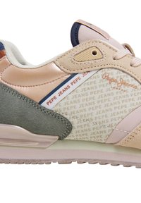 Pepe Jeans sneaker features a light pink upper with olive green suede accents, printed branding, and a textured rubber sole.