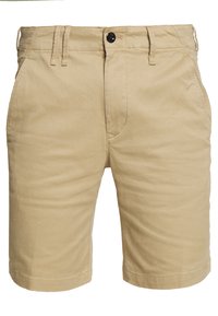 Béžové bavlněné šortky s hladkou texturou, s knoflíkovým zapínáním, poutky na opasek a dvěma předními kapsami. Klasický design, délka nad kolena.