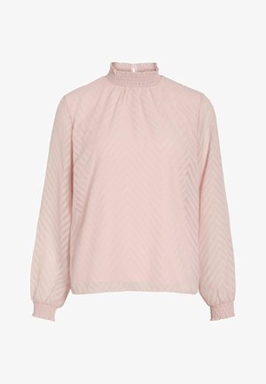 Dlhý rukáv, ružová blúzka s vysokým zhrnutým golierom. Obsahuje textúrovaný vzor v tvare V a smockované manžety pre zvýraznenie detailov.
