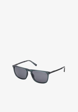Schwarze rechteckige Sonnenbrille mit dunkel getönten Gläsern und schlanken, geraden Bügeln, vor weißem Hintergrund dargestellt.