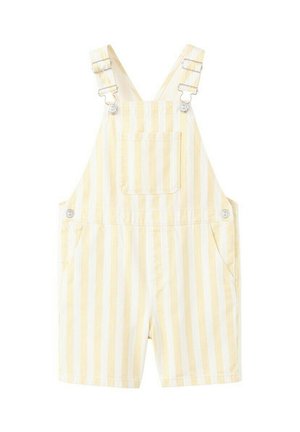 Salopette courte rayée verticalement jaune et blanche avec poche avant et bretelles réglables à boucle.