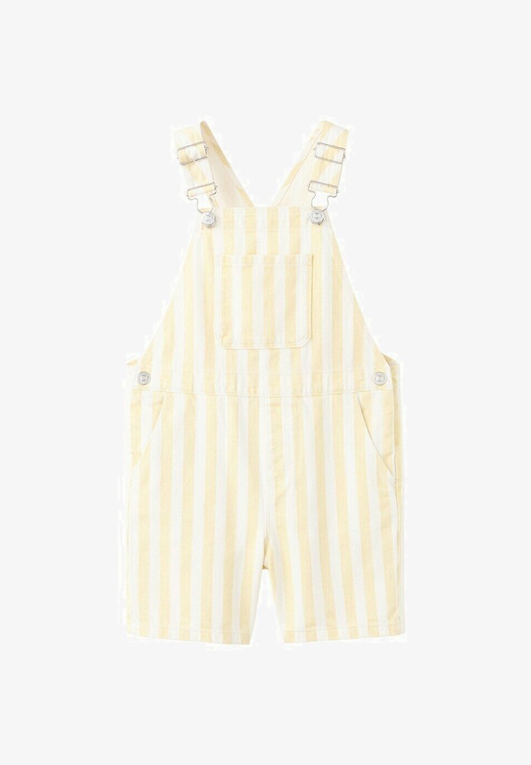Salopette courte rayée verticalement jaune et blanche avec poche avant et bretelles réglables à boucle.