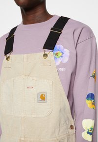 Carhartt WIP BIB OVERALL - Macacão de ganga - dusty brown faded