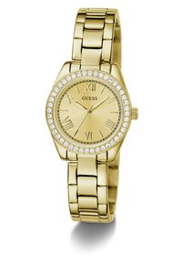 Montre-bracelet dorée avec un cadran rond, des chiffres romains et des accents en cristal autour de la lunette. Elle est dotée d'un bracelet en métal à maillons.