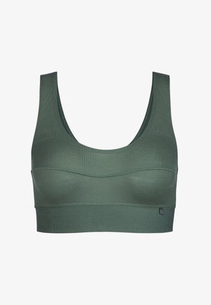 Green sports bra made of textured fabric, featuring a scoop neckline, wide straps, and a seamless design with subtle stitching details.