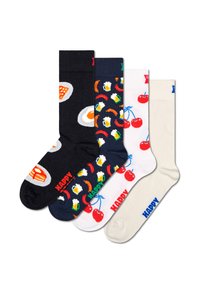 Cztery pary oryginalnych skarpetek: czarne z grafiką jedzenia, granatowe z kolorowymi wzorami, białe z wiśniami i kremowe z niebieskimi akcentami.